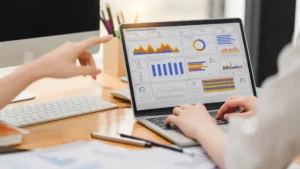 B2B content audit dashboard and analytics on laptop.