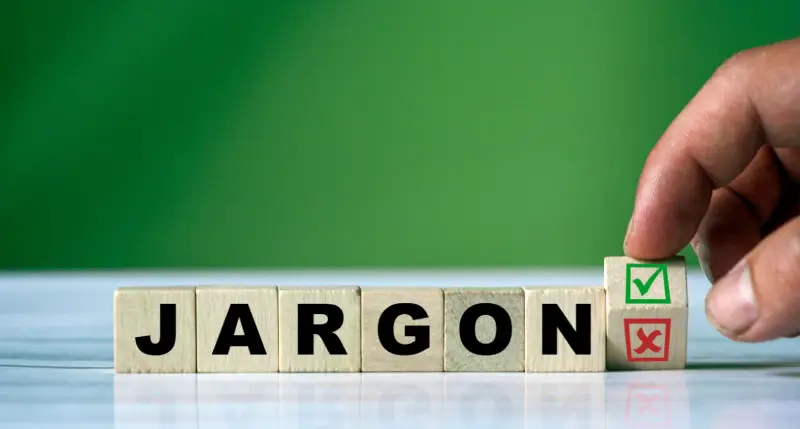Wooden blocks spelling out ‘jargon’ illustrating proper use of industry jargony