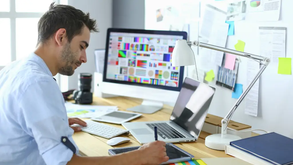 designer working on visuals reflecting graphics design trends in 2026