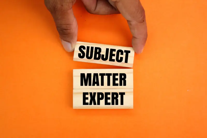 Subject Matter Expert text displayed on wooden horizontal blocks