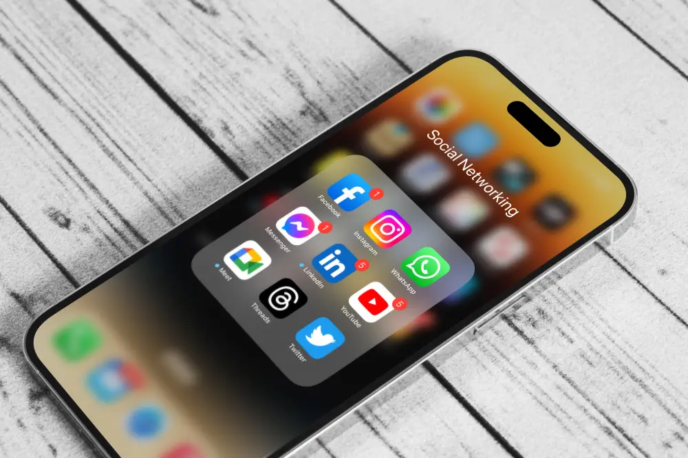 Mobile interface with social platforms highlighting content creation and engagement