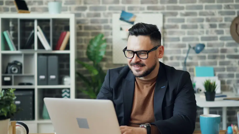Professional reviewing financial reports to ensure accuracy and compliance