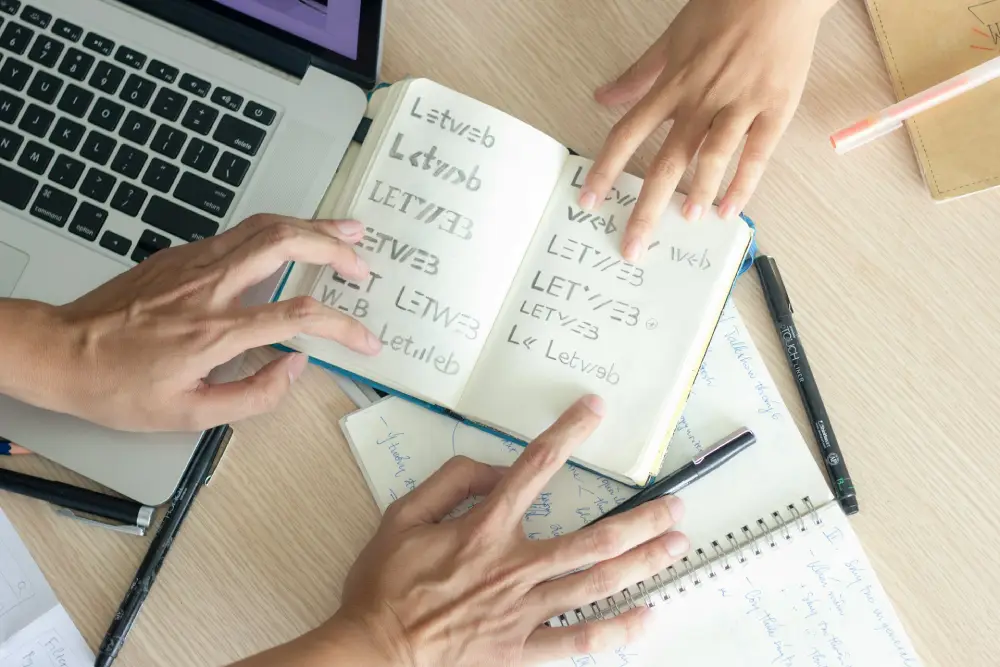 Professional business translation services with expert linguists reviewing multilingual documents