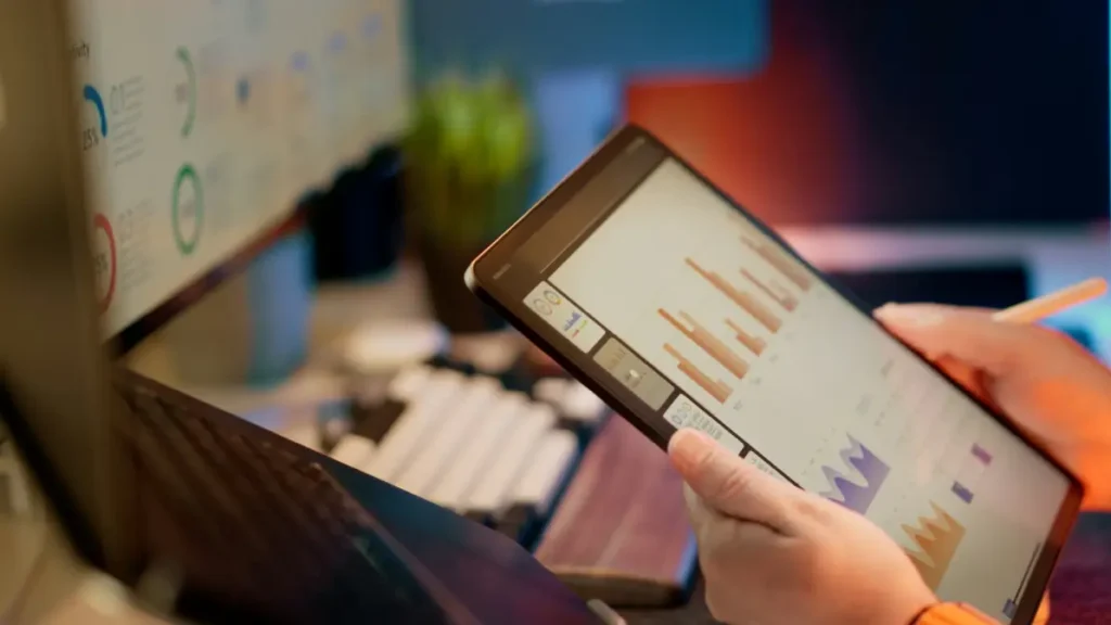 Financial analyst reviewing charts and data, representing financial translation services