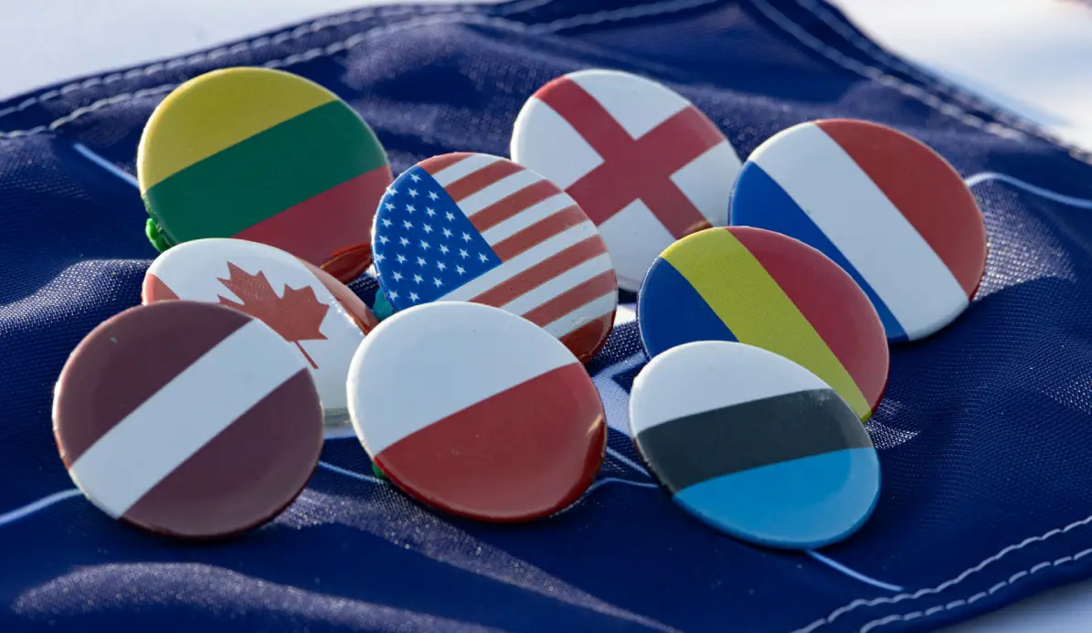 Assorted country flag badges representing the global reach of financial translation services