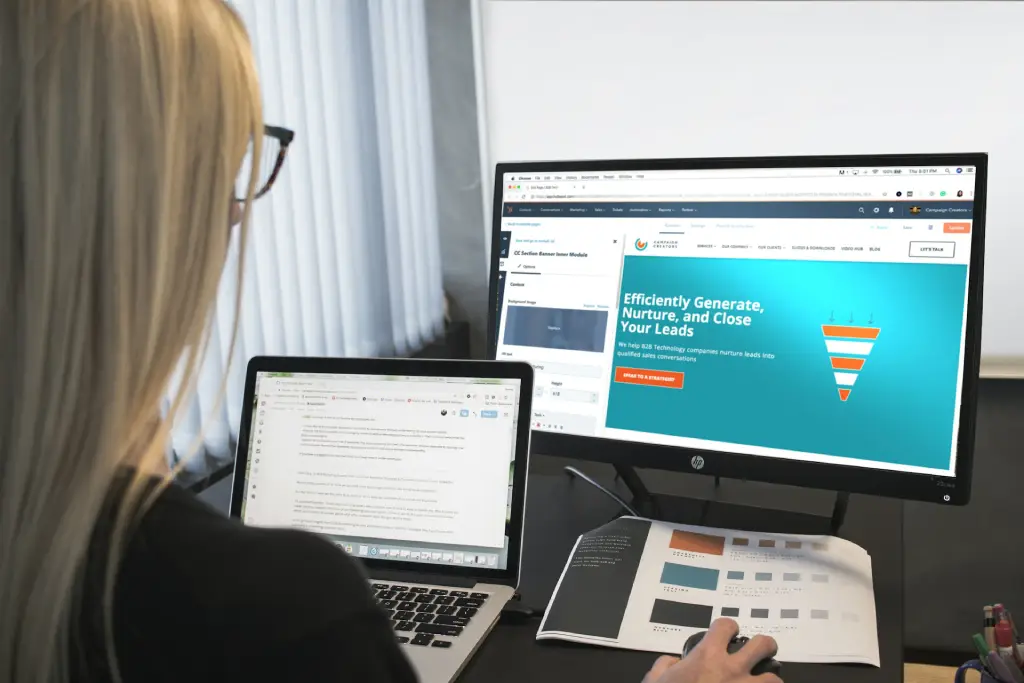 Laptop displaying website content and marketing copy for attracting and converting leads